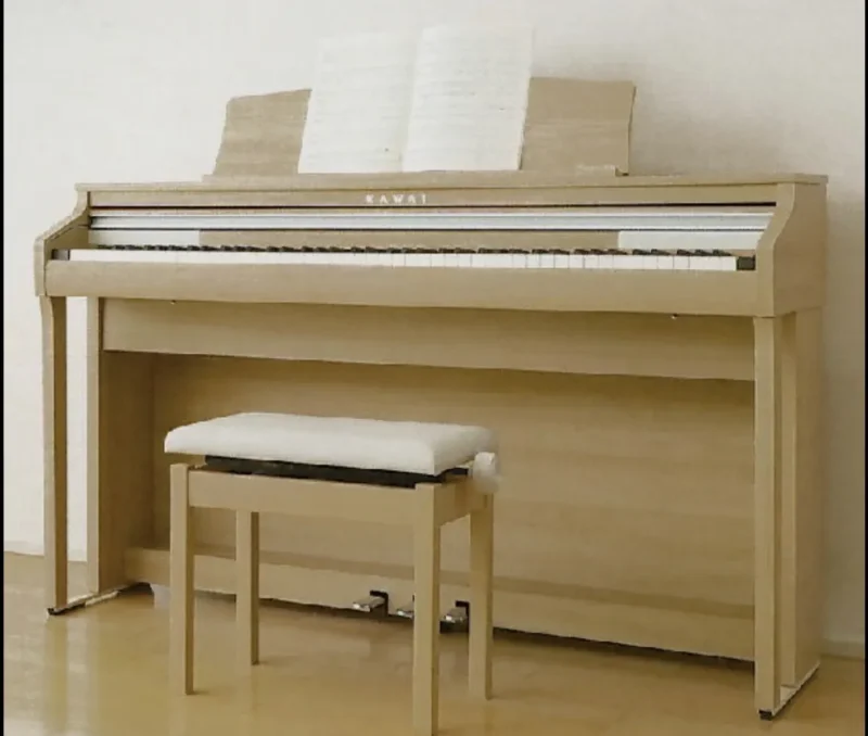 Digital piano Kawai CA401 White Maple dengan desain elegan, tuts kayu responsif, dan tampilan natural warna putih maple.