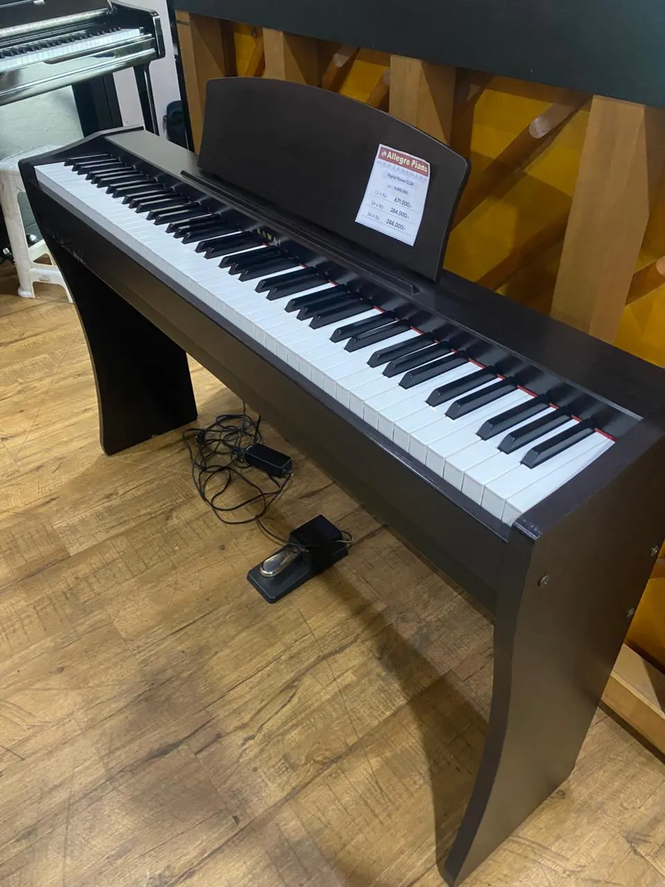 Piano Digital Kawai CL26 dengan desain slim elegan dan keyboard hammer action realistis di Showroom Allegro Piano